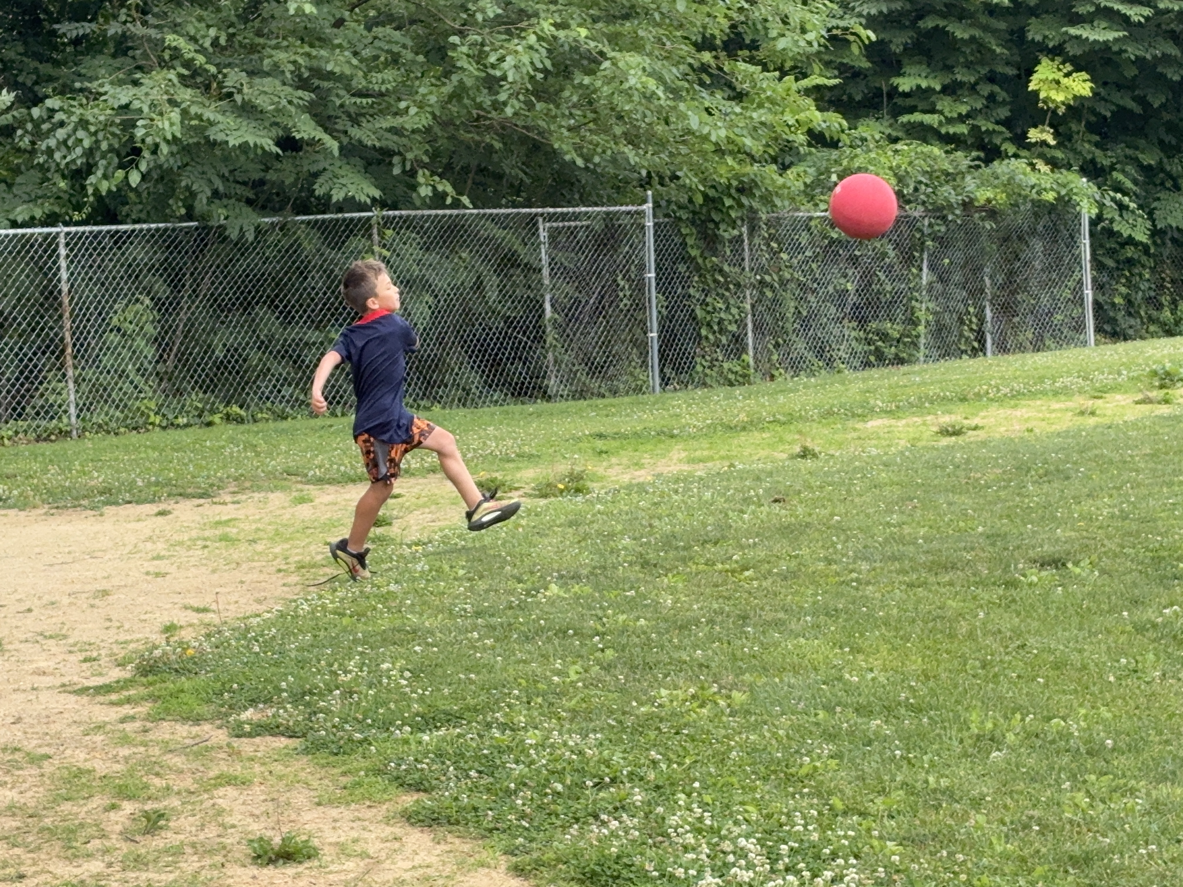Boy Logan making his kickball debut