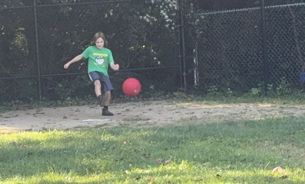 Griffin kicking while somehow still smiling